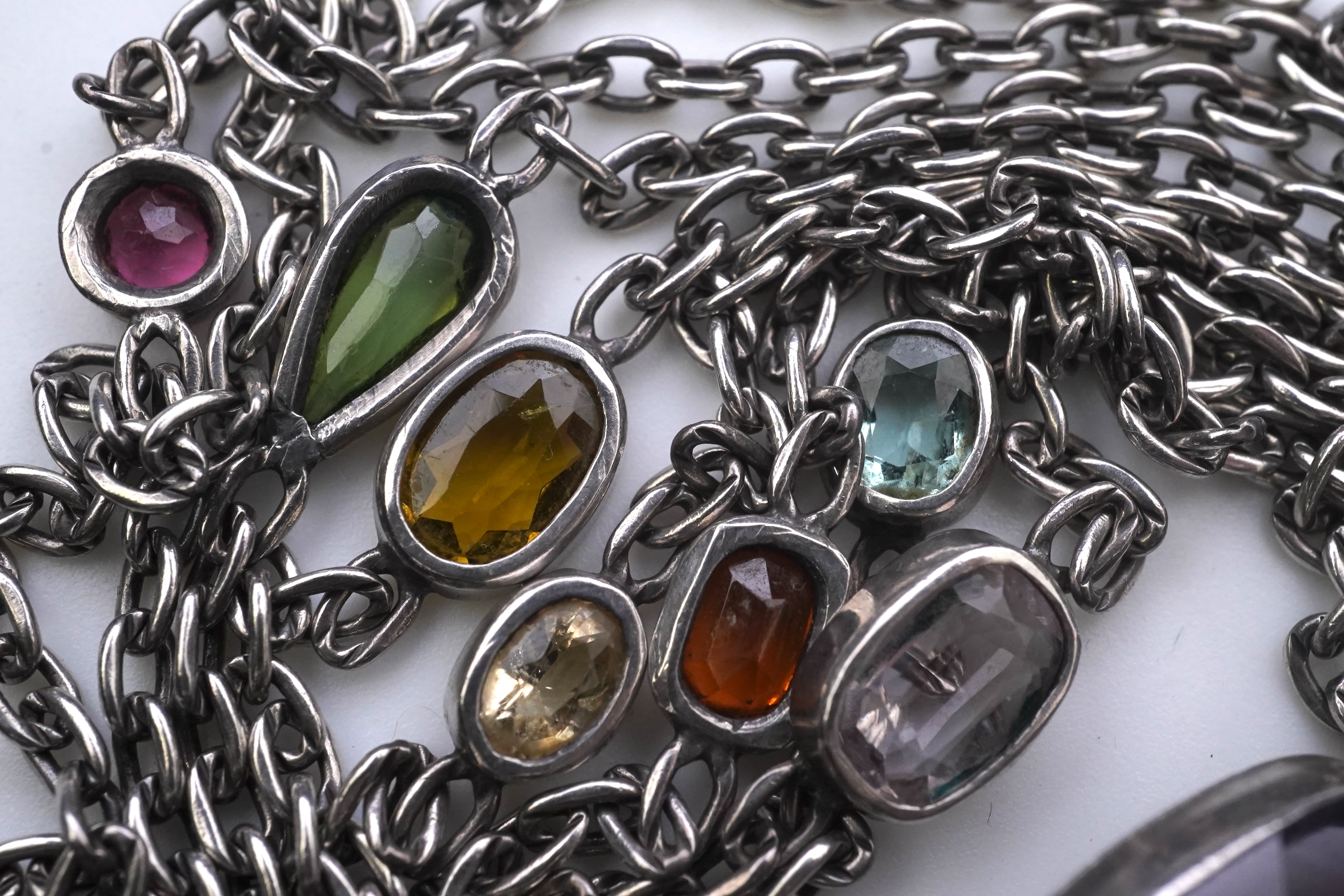 A collection of silver and gem-set jewellery